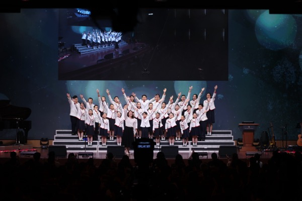 Daejun World Vision Children's Choir performing on stage