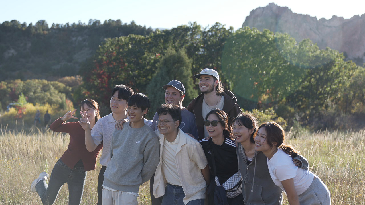 YWAM Château OKDTS students laughing together outdoors in Colorado